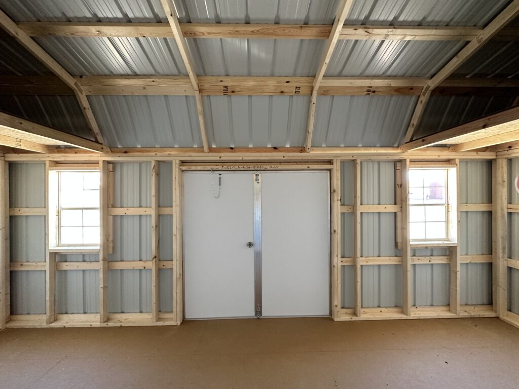 view of the double doors from inside the 10x20 metal lofted barn 