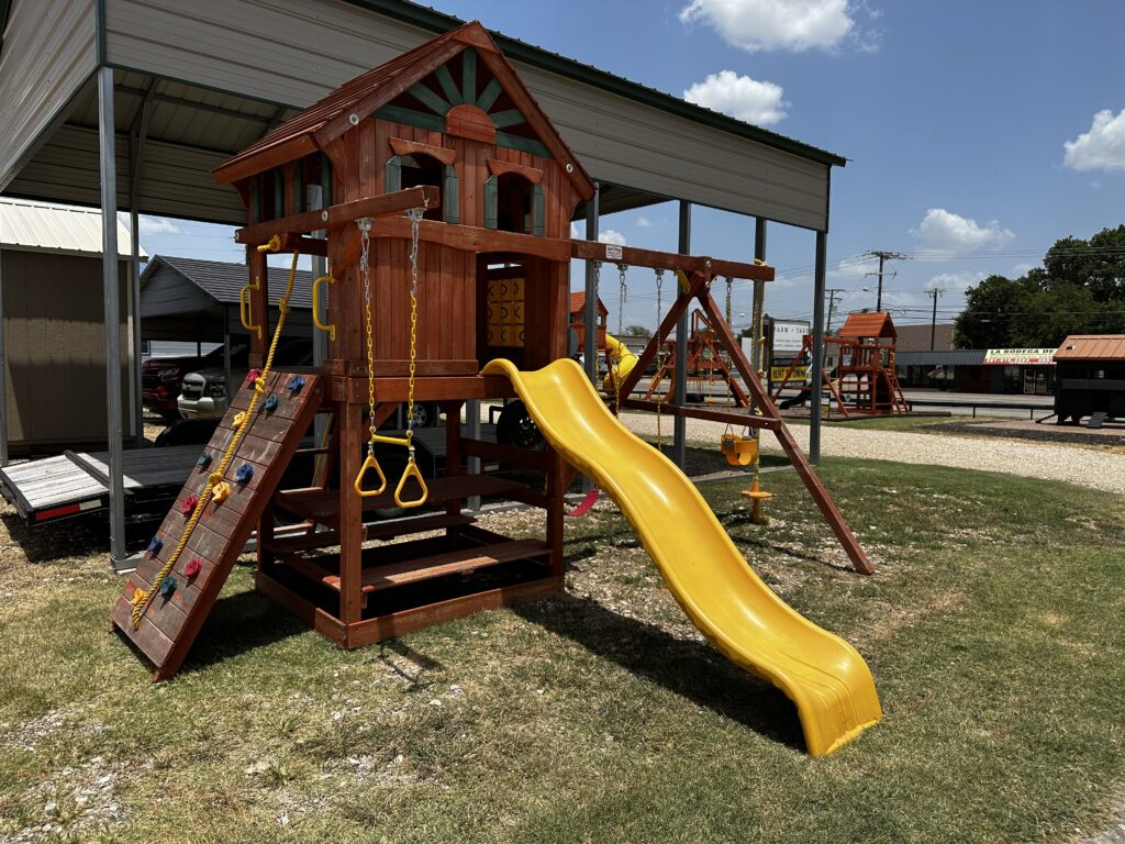 Yellow Wave Slide and Trapeze Swing