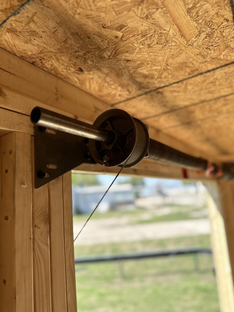 Heavy duty spring for the 10x16 Rampage Door