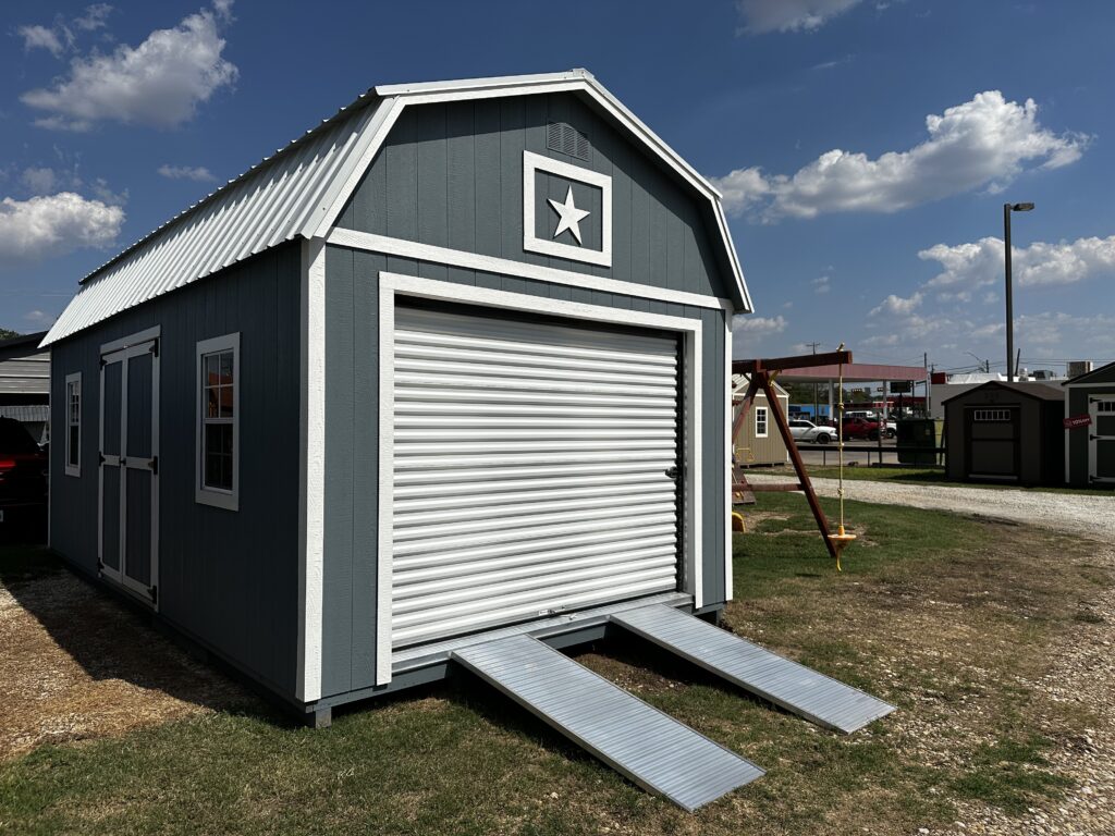 9x7 roll up door on right 12' end of the 12x24 Side Lofted Barn