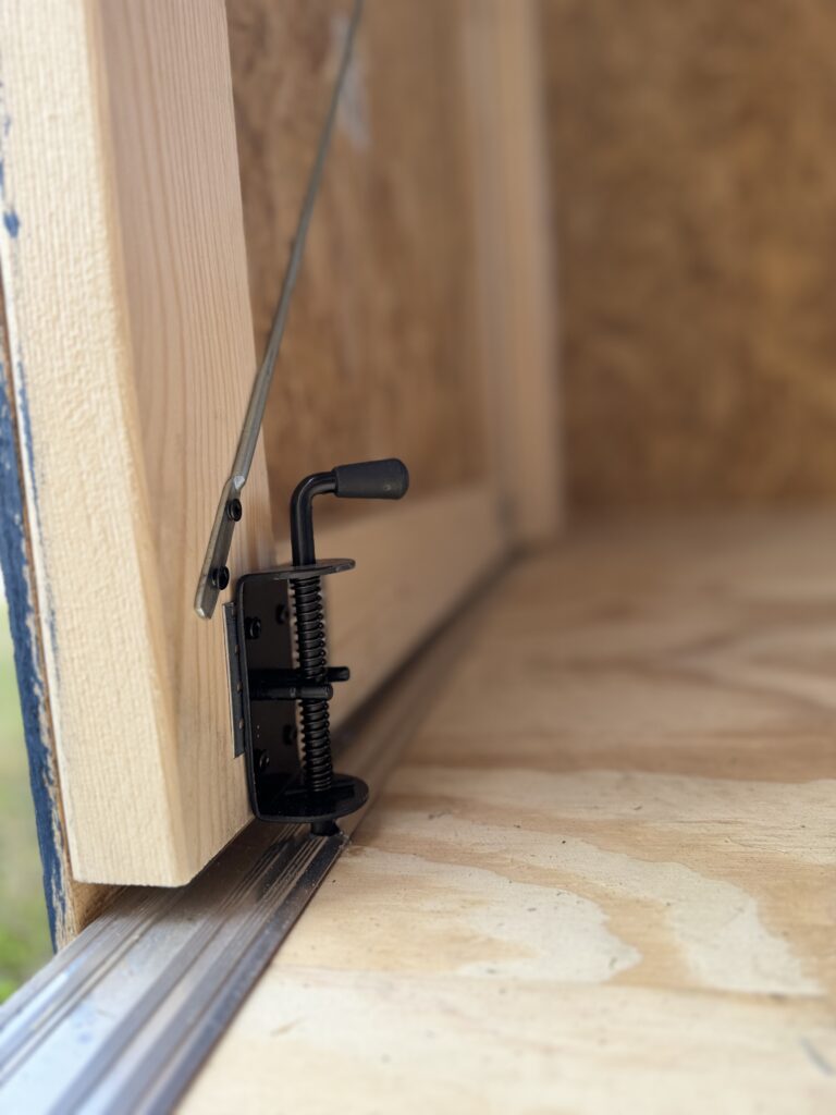 secure door drop latches on the inside of the shed doors 