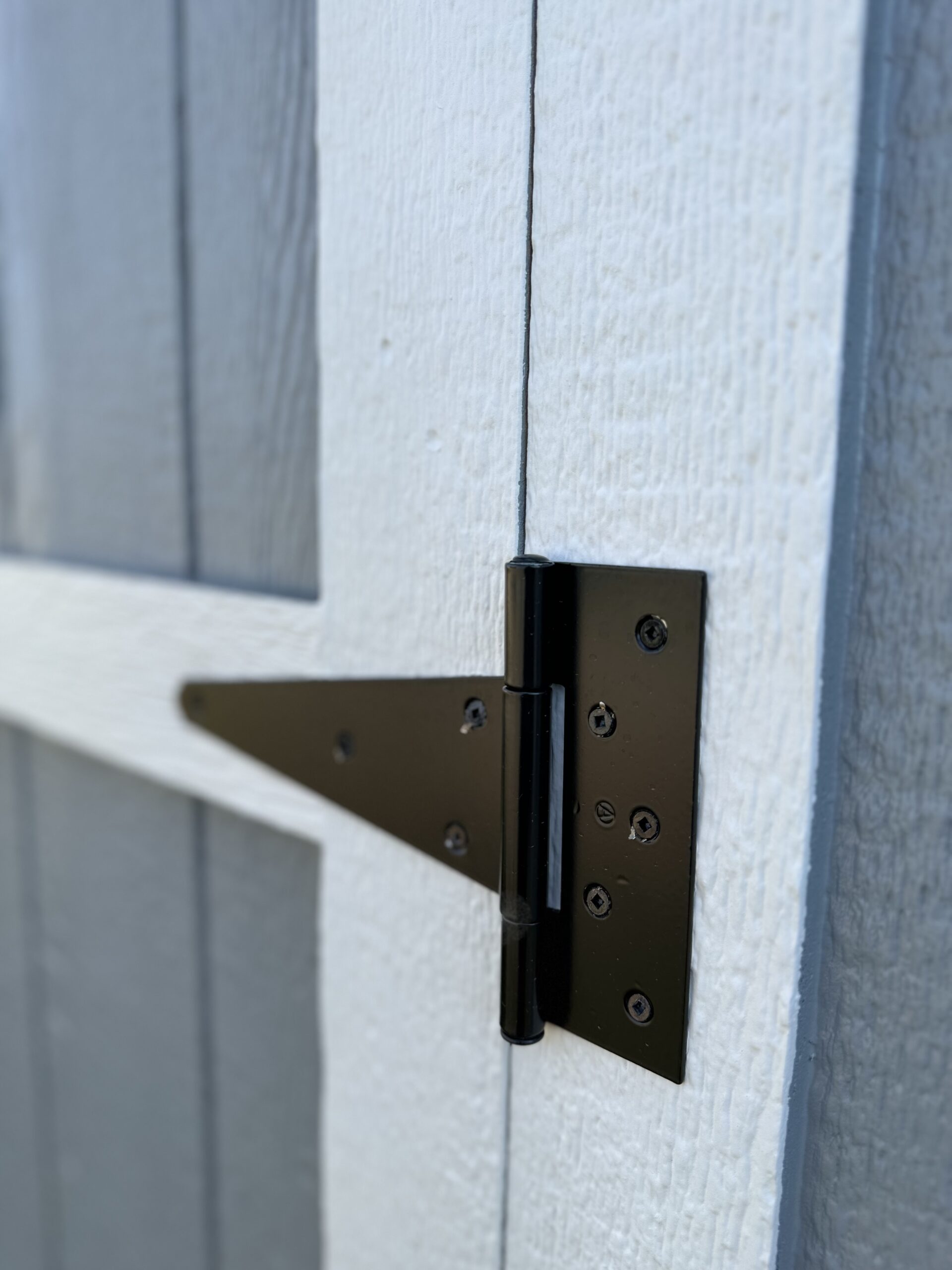 8" heavy-duty hinges on the door of the 10x16 garden shed 